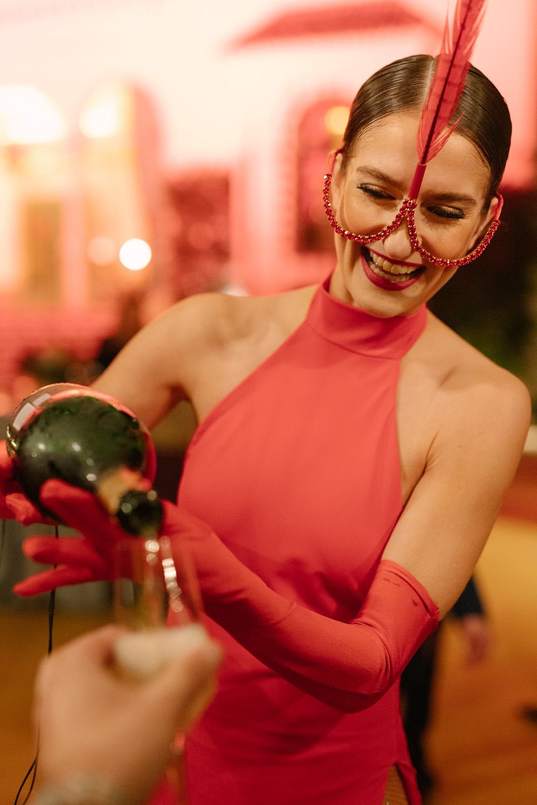 performer serving champagne