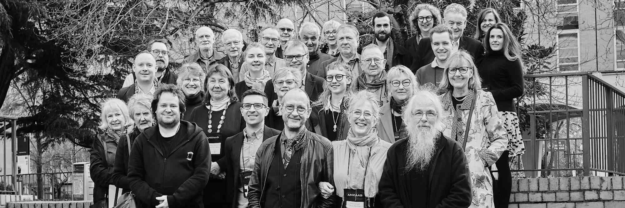 ANZAAB 2023, outdoors for a photo in front of trees.