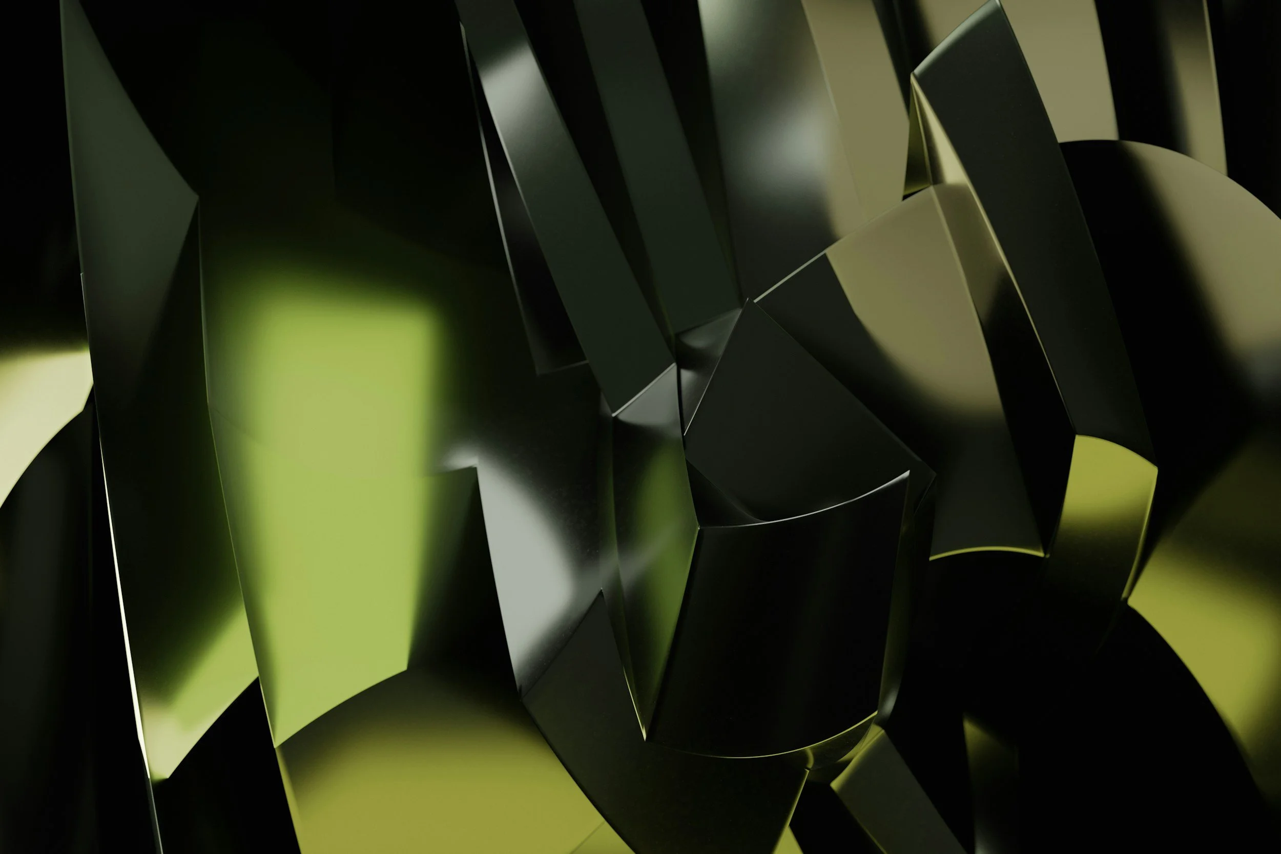 Nærbillede af en glat, sort plaststruktur med reflekterende overflader og grønne reflekser.