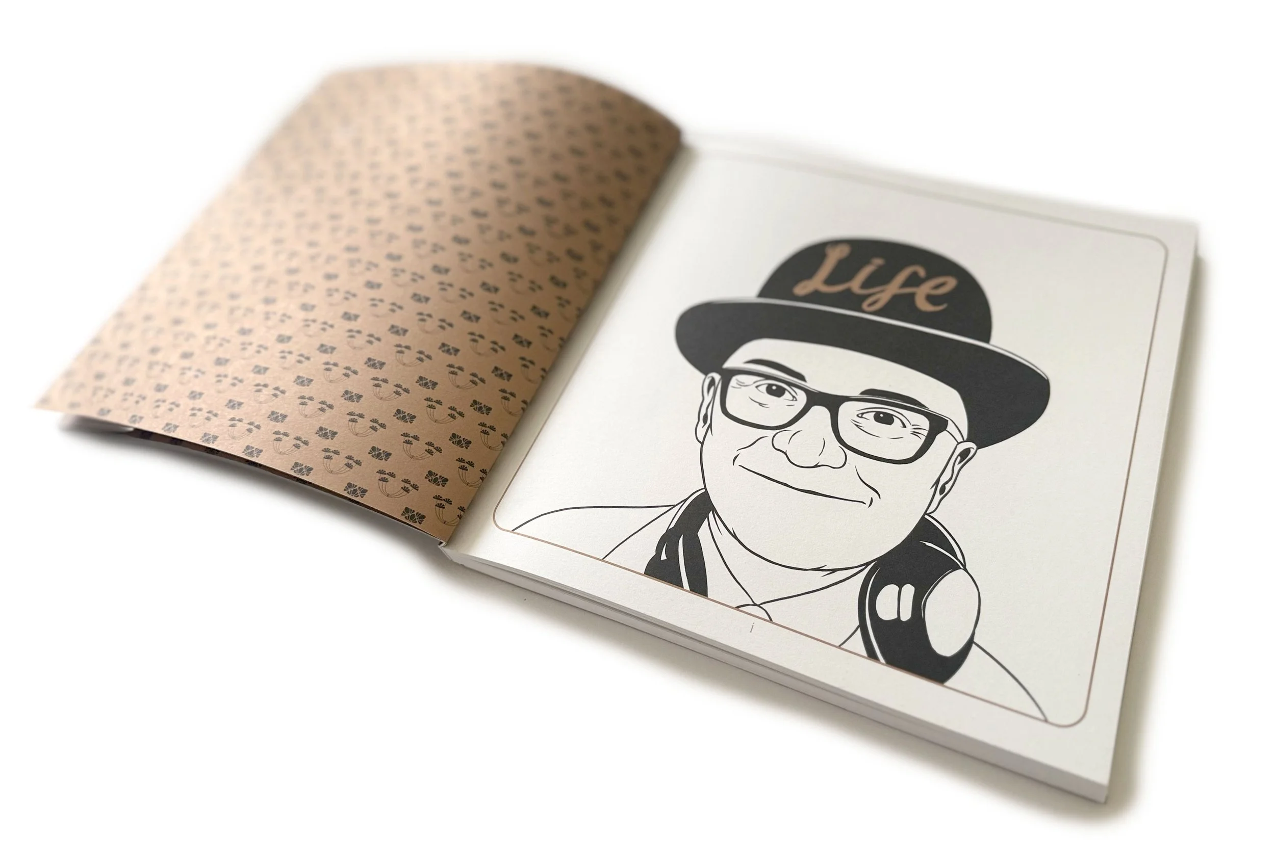 Open book with a black and white portrait of Stuart Lloyd Gould.