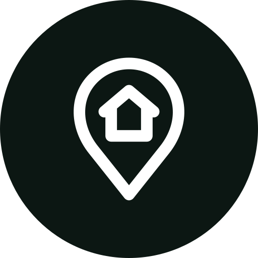 Location icon with a house inside a map pin symbol on a black background.