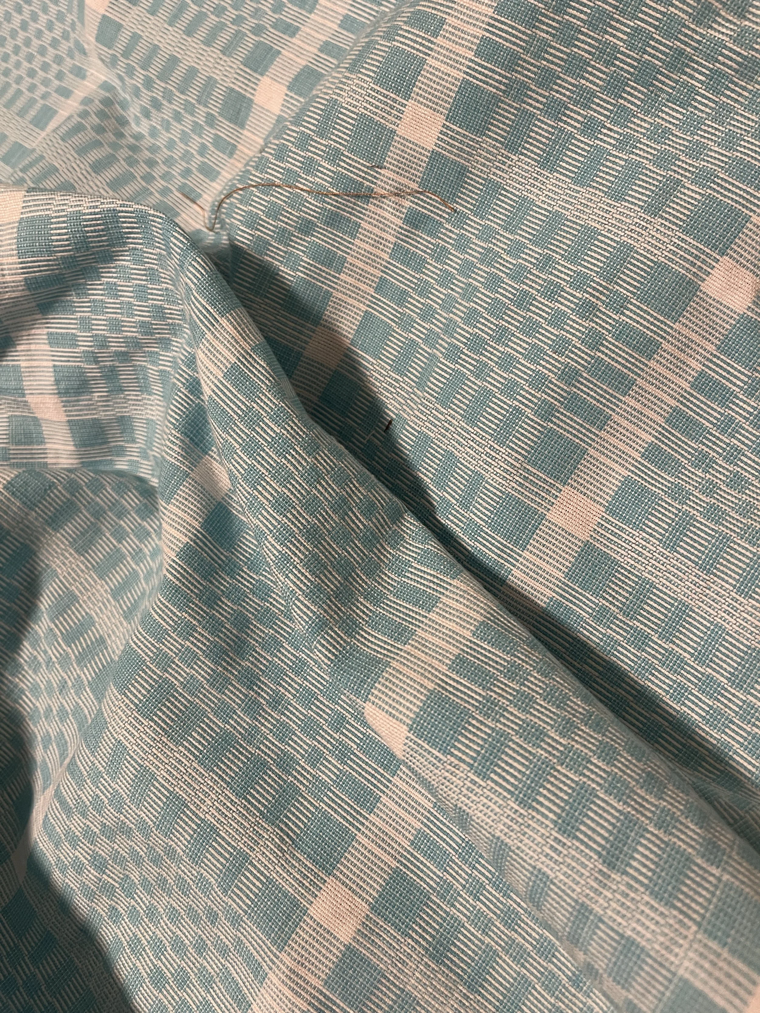 Handwoven Binakol fabric from the Philippines, a fabric traditionally woven with geometric patterns believed to protect against bad spirits.