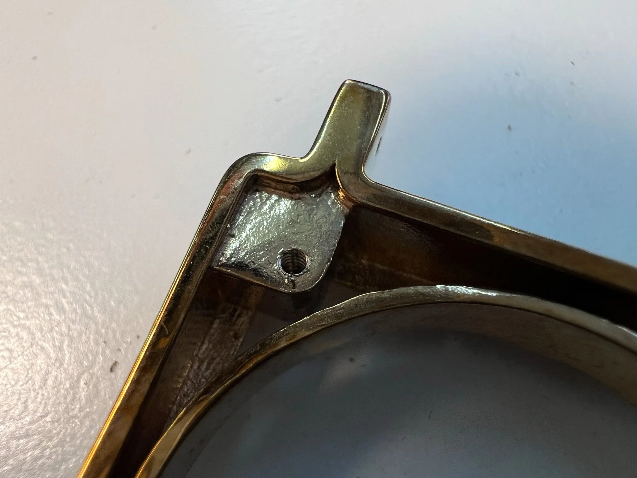 Detail of case-back mount and non-square corner due to print defects