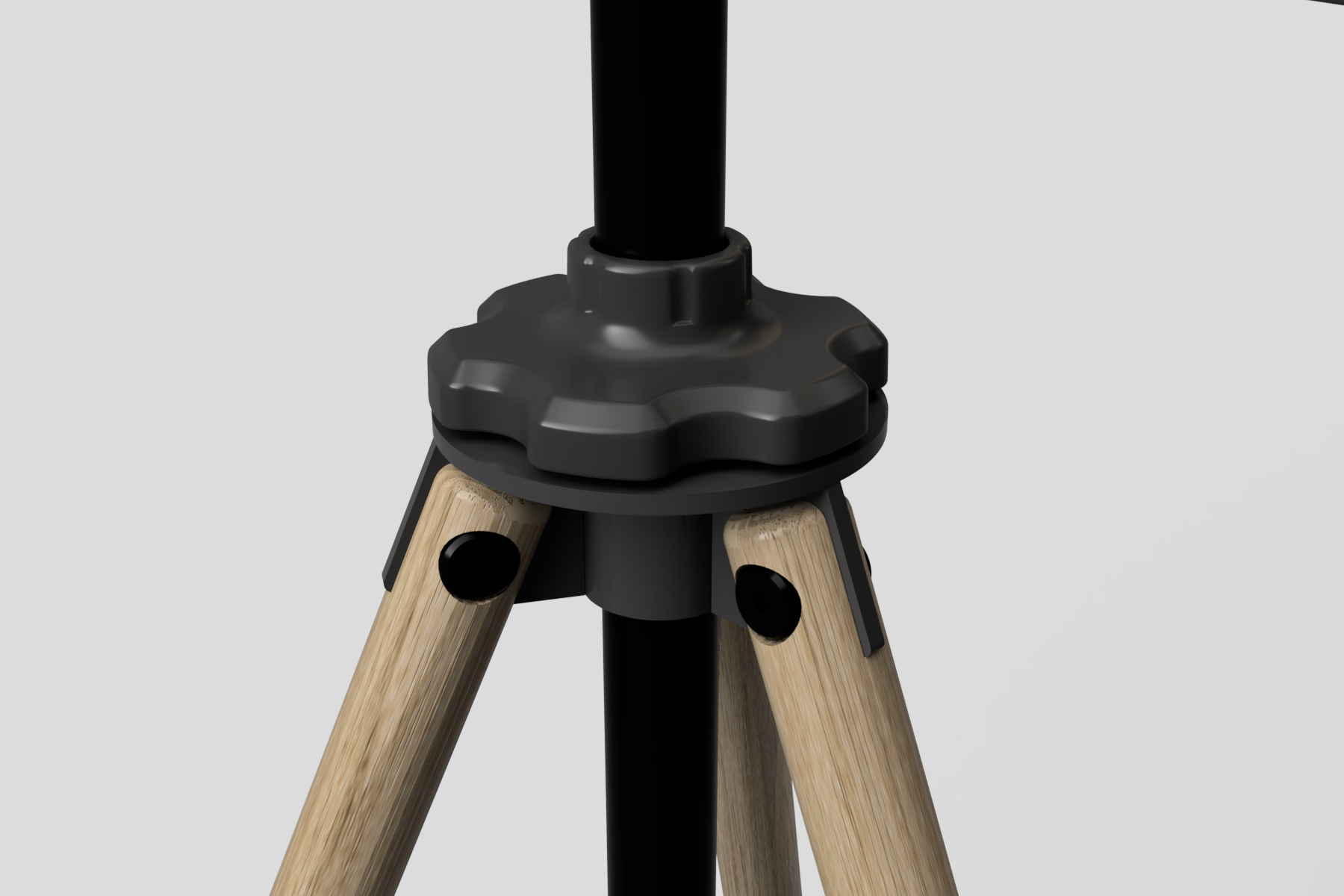 Final leg and twist-lock hub render - wood tripod meeting powder-coated metal junction