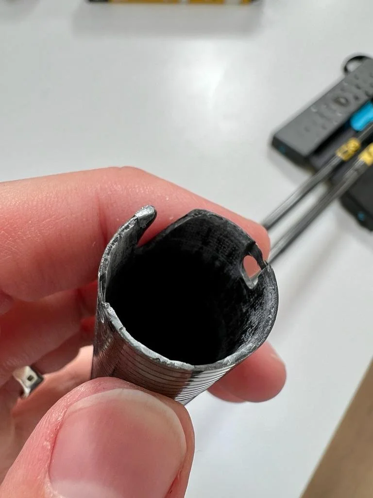 Carbon fiber to metal hinge junction - the critical stress point