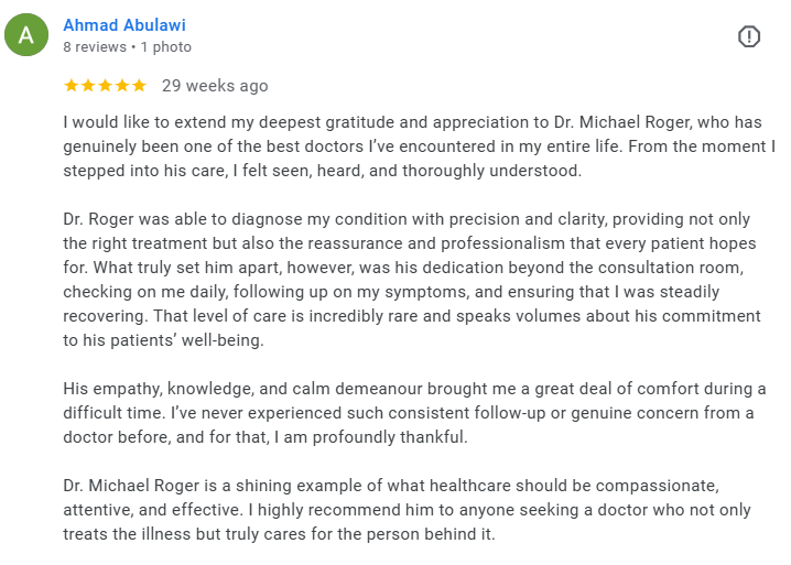 Screenshot of a five-star review for Dr. Michael Roger by Ahmad Abulawi, praising his medical care and professionalism. Médecin généraliste Français à Dubaï / GP / French GP / French Doctor / French family medicine