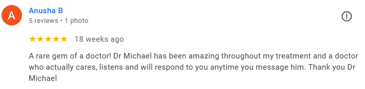 Screenshot of a Google review from Anusha B praising Dr. Michael, describing him as an attentive and caring doctor. Médecin généraliste Français à Dubaï / GP / French GP / French Doctor / French family medicine