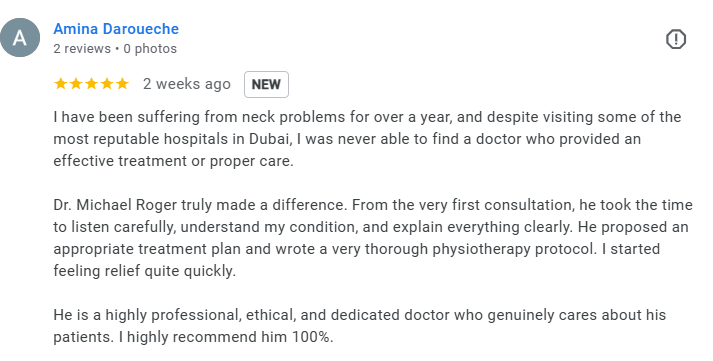 Screenshot of a Google review for a doctor named Dr. Michael Roger, praising his professionalism and treatment for neck problems.