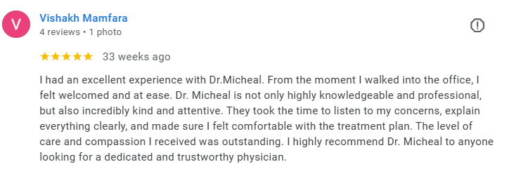 Screenshot of a Google review by Vishakh Mamfara, five stars, describing a positive experience with Dr. Micheal, mentioning professionalism, kindness, and attentiveness. Médecin généraliste Français à Dubaï / GP / French GP / French Doctor / French f