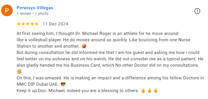 Screenshot of a review about Dr. Michael Roger, praising his quick movements and caring attitude, with emojis of a candy, a face with a medical mask, a face with sunglasses, and three thumbs up. Médecin généraliste Français à Dubaï / GP / French GP /