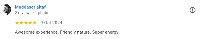 Screenshot of a review by Muddaser altaf with 5 stars, dated October 9, 2024, praising an experience with friendly nature and energy. Médecin généraliste Français à Dubaï / GP / French GP / French Doctor / French family medicine