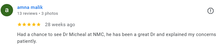 Screenshot of a Google review for Dr. Micheal by Amna Malik, mentioning a positive experience. Médecin généraliste Français à Dubaï / GP / French GP / French Doctor / French family medicine