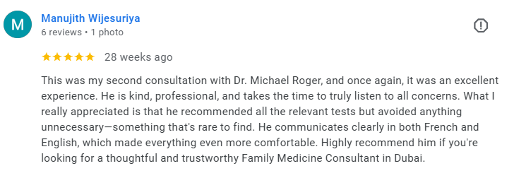 Screenshot of Manujith Wijesuriya's review on a medical website, describing positive experience with Dr. Michael Roger. Médecin généraliste Français à Dubaï / GP / French GP / French Doctor / French family medicine