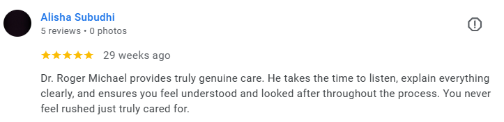 Screenshot of a 5-star review on a review platform for Dr. Roger Michael, praising his genuine care and thoroughness. Médecin généraliste Français à Dubaï / GP / French GP / French Doctor / French family medicine