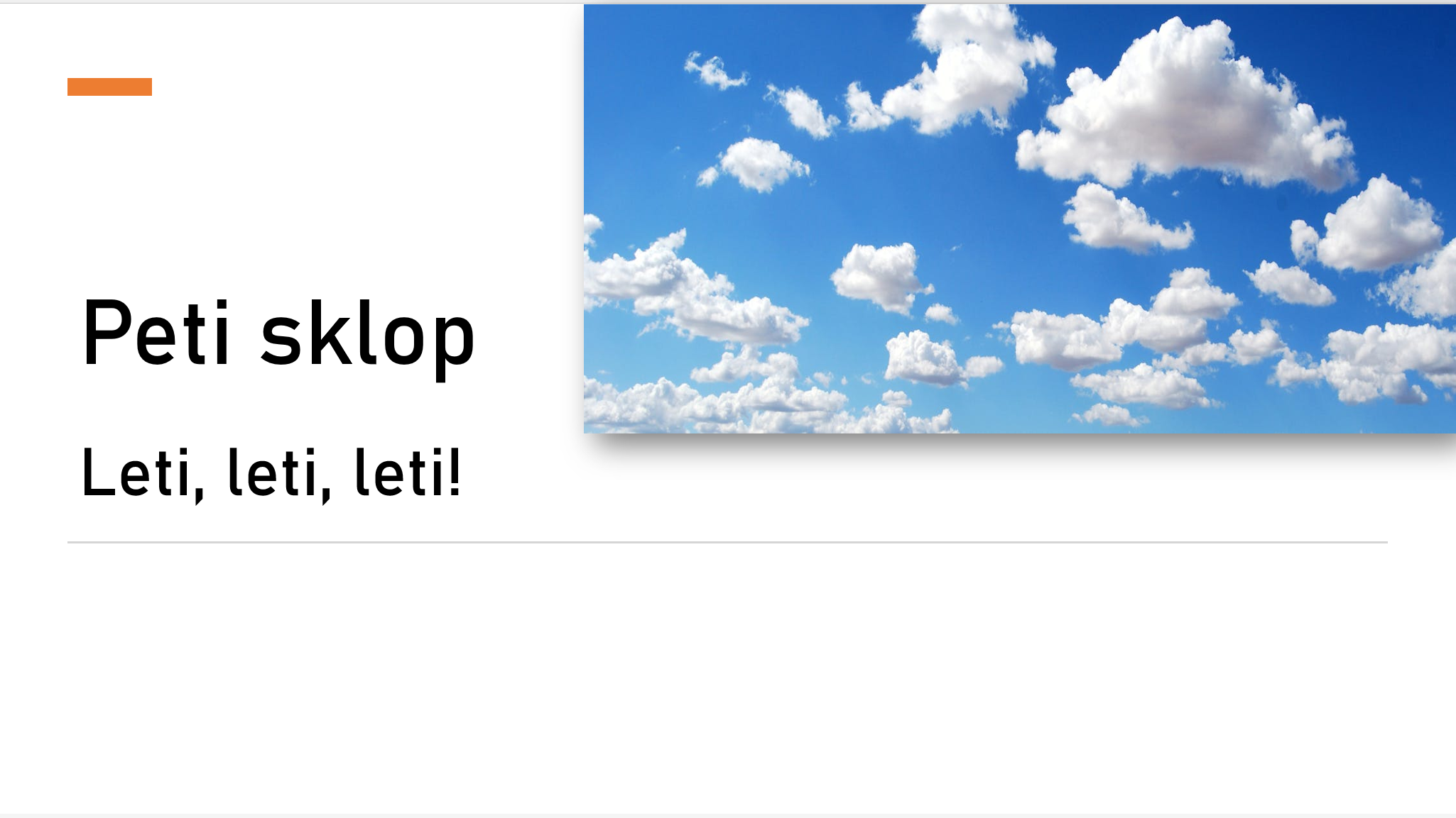 Blue sky with scattered white clouds.