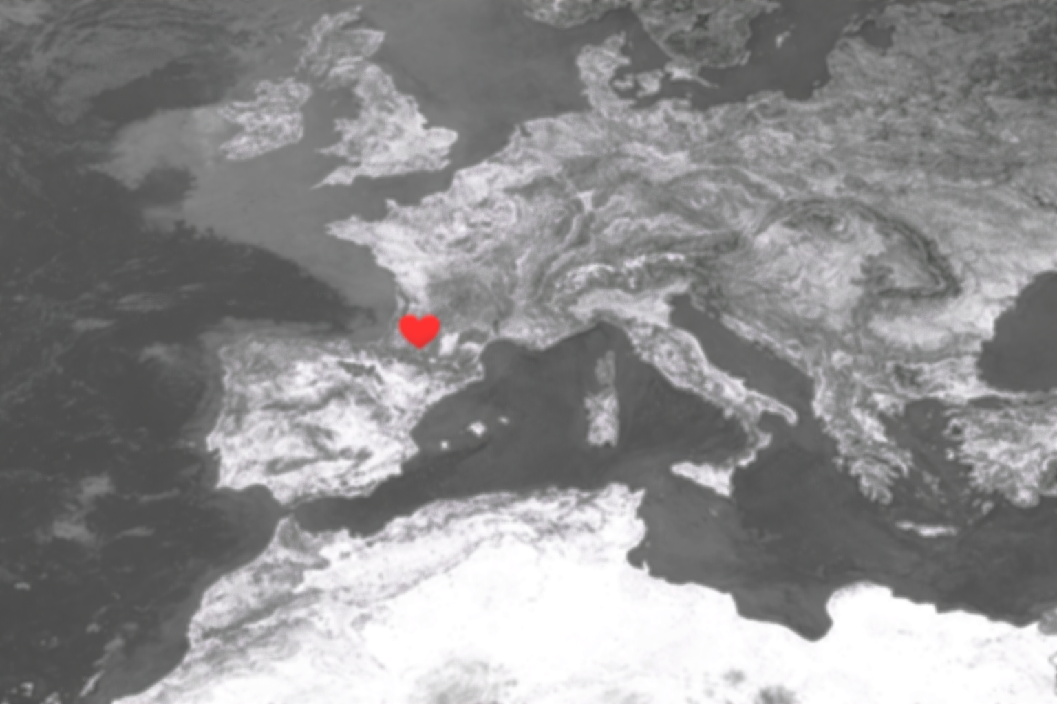 Carte de l'Europe en niveaux de gris avec un cœur rouge marqué proche de Bordeaux.