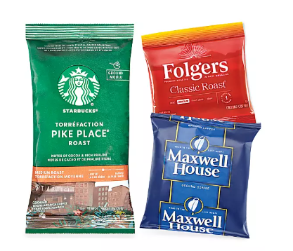 Curated coffee amenities including Starbucks, Folgers, and Maxwell House, perfectly stocked and organized to enhance the morning experience for short-term rental guests.