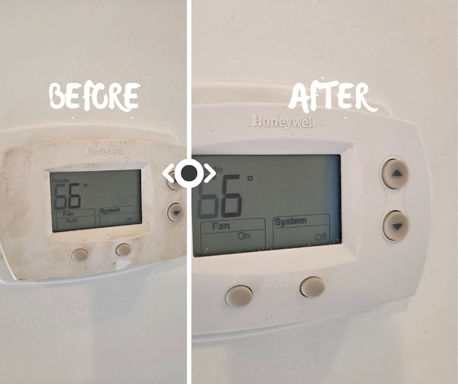 Detailed cleaning of a Honeywell thermostat, demonstrating Elite Southern Turnovers' commitment to sanitizing high-touch points for guest safety and hygiene.