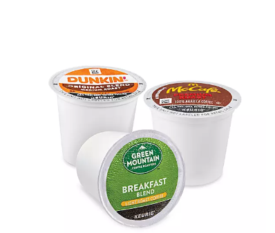 Selection of premium single-serve coffee pods including Dunkin' and McCafé, stocked by Elite Southern Turnovers to provide a high-end morning experience for vacation rental guests.