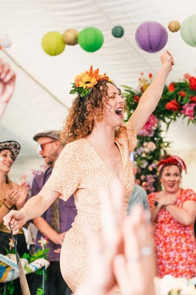 A wedding guest loving the games at one of Disco Ceilidh's Wedding Gameshows.