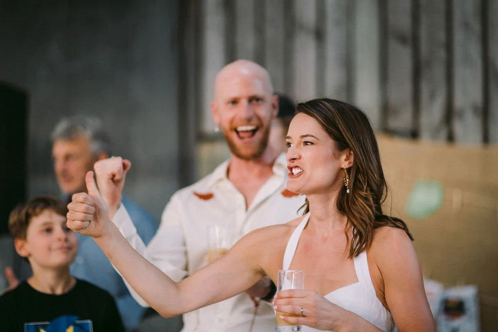 An enthusiastic participant in a Wedding Gameshow led by the Disco Ceilidh team.
