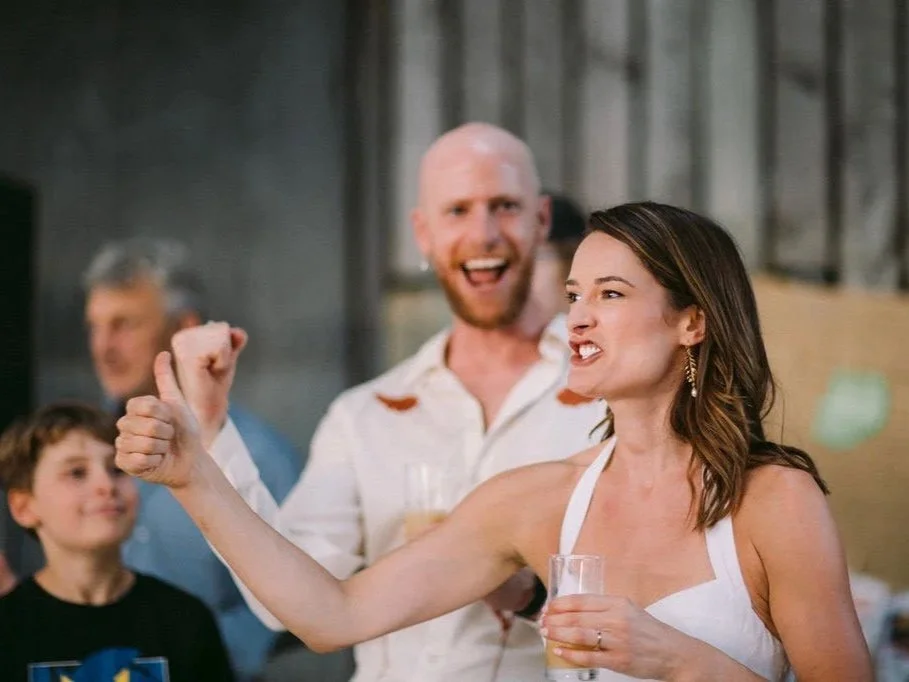 The bride participating in the Wedding Gameshow at her wedding.