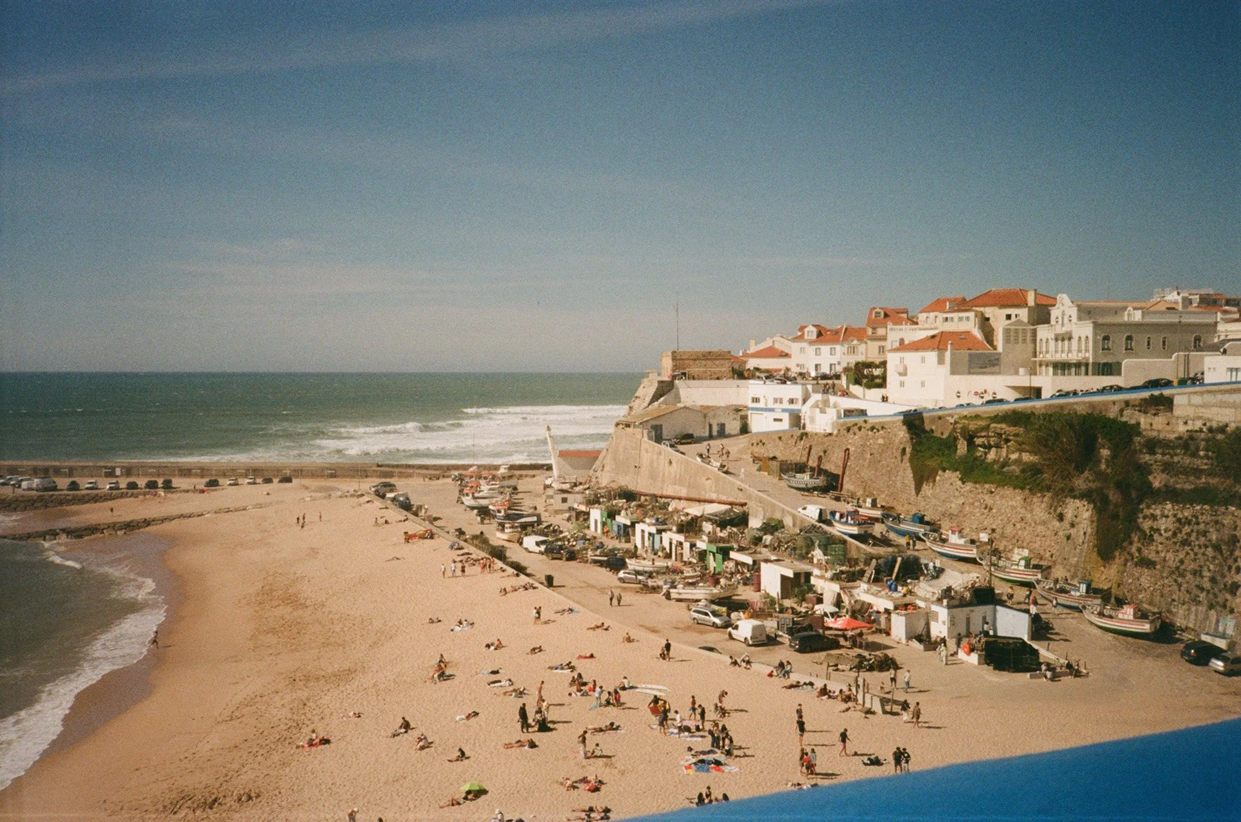 Stroll through Ericeira's charming streets, watch surfers ride Atlantic waves, and toast the sunset from a cliffside restaurant.