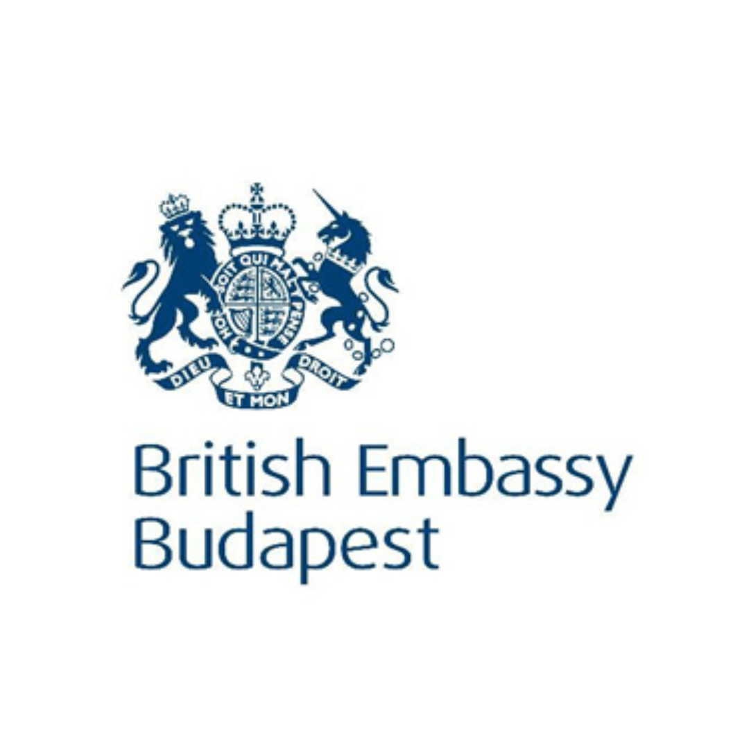 Logo of the British Embassy Budapest featuring a coat of arms with a lion and a unicorn, and the text 'British Embassy Budapest'.