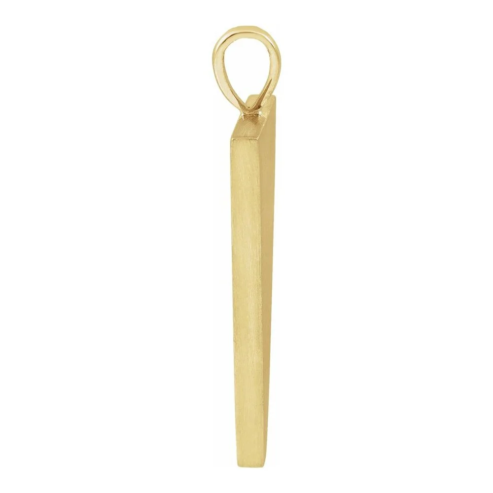 A gold-colored sewing pin with a square head and a loop at the top for attaching to a piece of fabric.