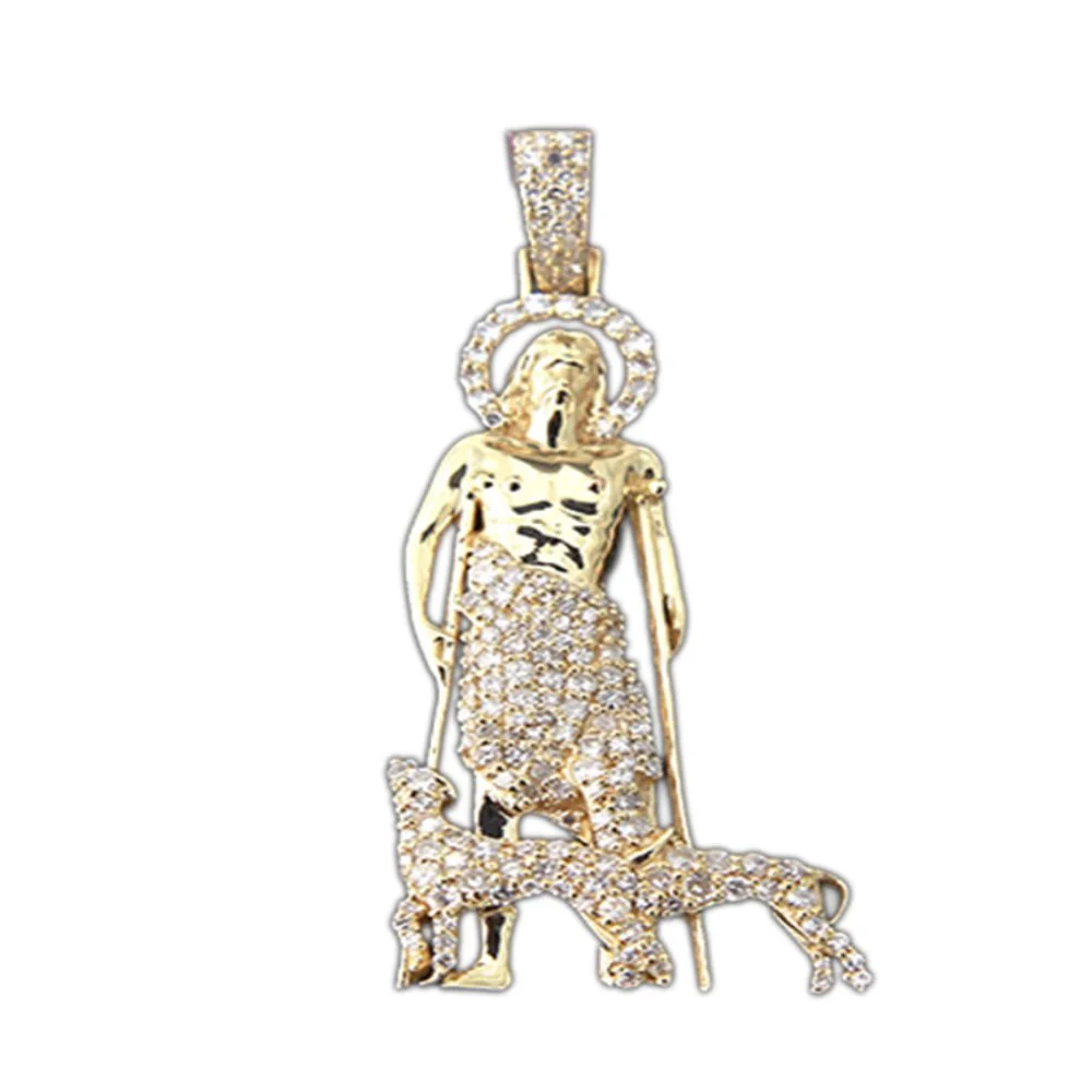 Gold pendant featuring a saint-like figure with a dog at its feet, adorned with diamonds.