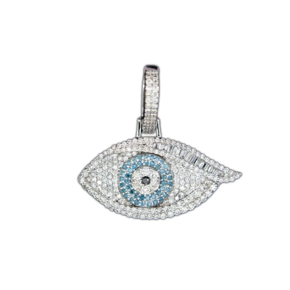 Jewelry pendant shaped like an eye with a decorative center, encrusted with diamonds and blue gemstones.
