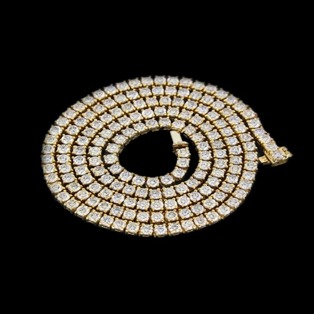 Gold and diamond spiral jewelry piece on black background