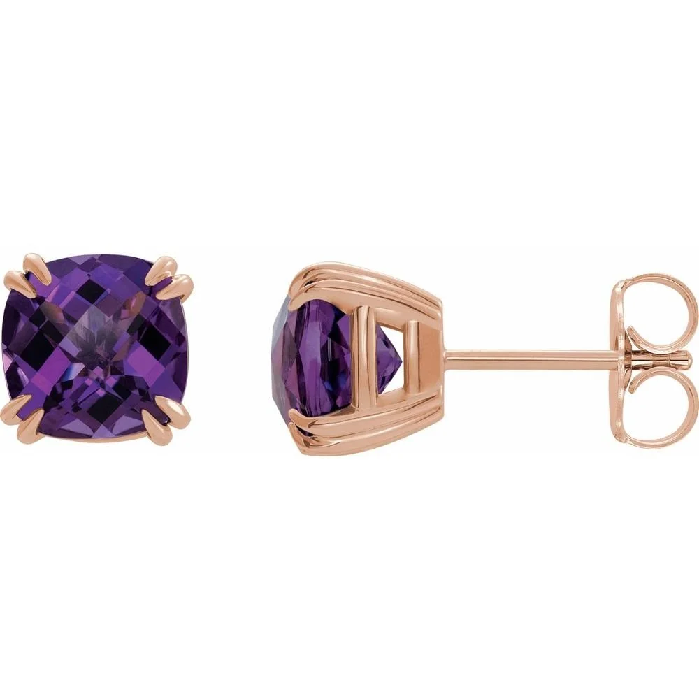 Pair of rose gold stud earrings with large purple gemstones.