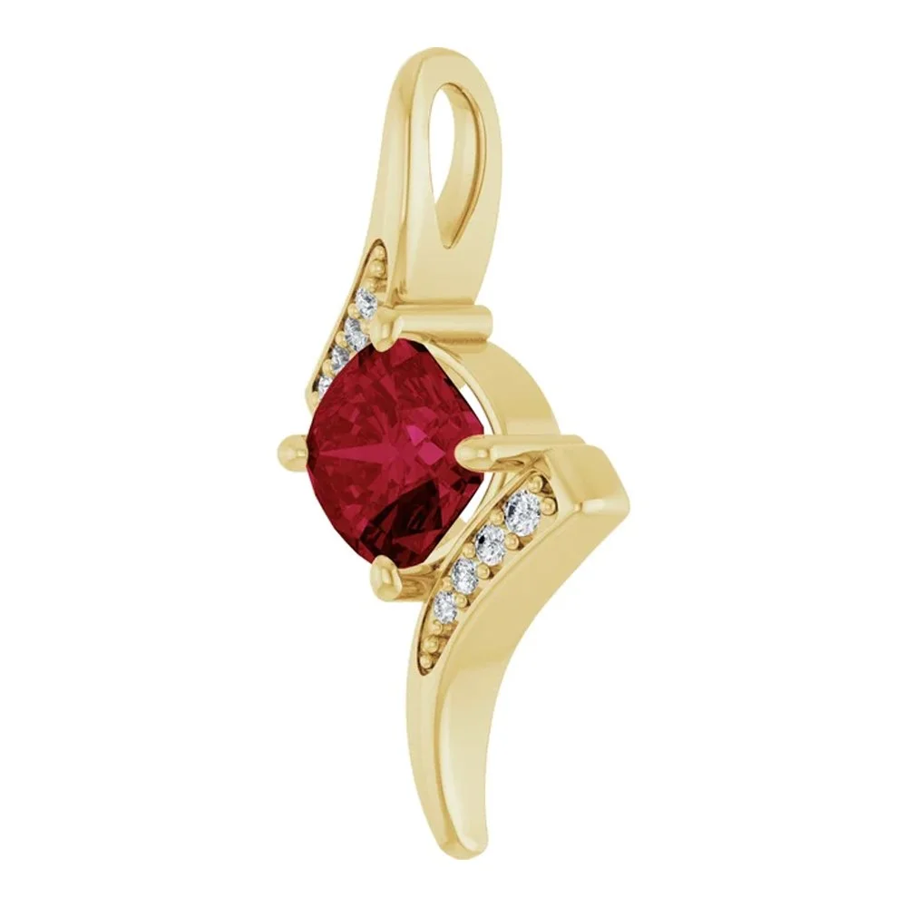 Gold ring with a large red gemstone and small diamonds on each side.