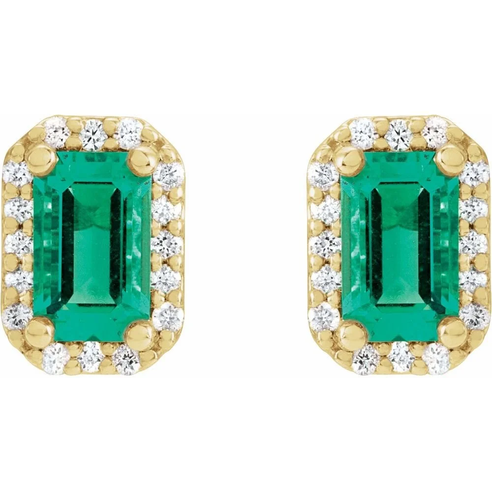 Pair of earrings with large emerald-cut green gemstones surrounded by small clear diamonds, set in gold.