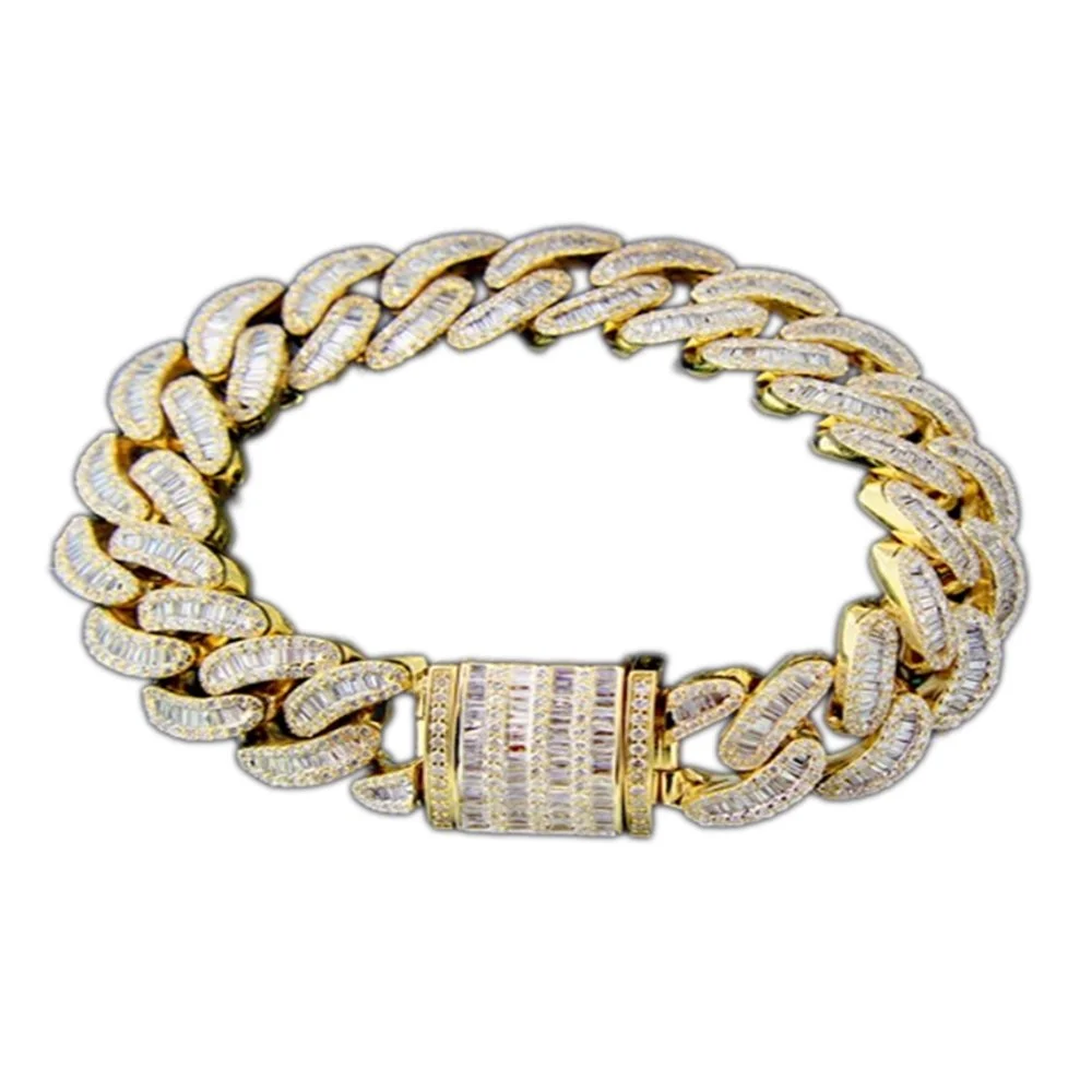 Gold chain bracelet with diamond embellishments and a clasp.