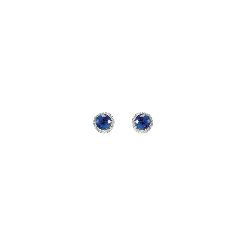 Pair of blue gemstone and diamond stud earrings on a white background.