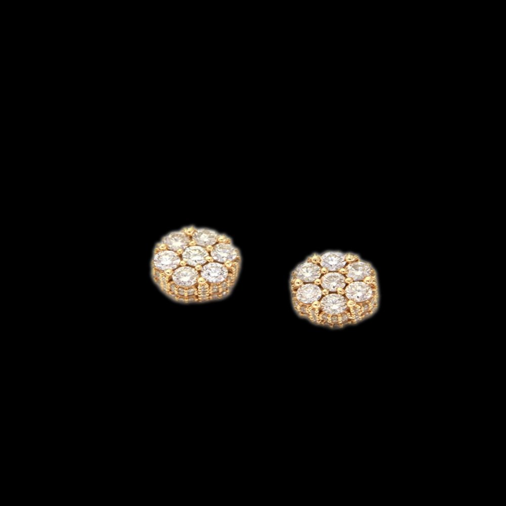 Pair of gold earrings with multiple small diamonds arranged in a circular pattern on black background.