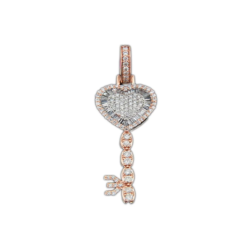 A rose gold pendant with a heart-shaped design, encrusted with diamonds, and a dangling key-shaped charm also adorned with diamonds.