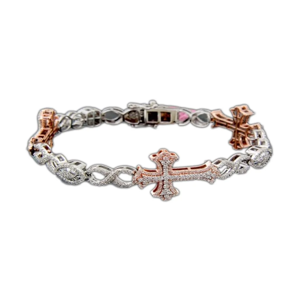 A bracelet with a silver and rose gold chain, featuring a large cross and diamond accents.