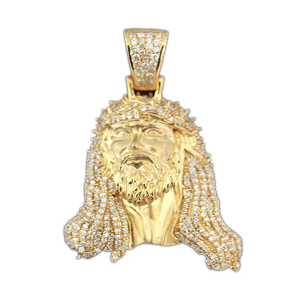Gold pendant with a detailed depiction of Jesus Christ's face, surrounded by a crown of thorns, encrusted with numerous small diamonds.