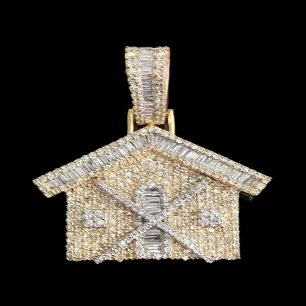 A gold house-shaped pendant decorated with numerous small diamonds against a black background.
