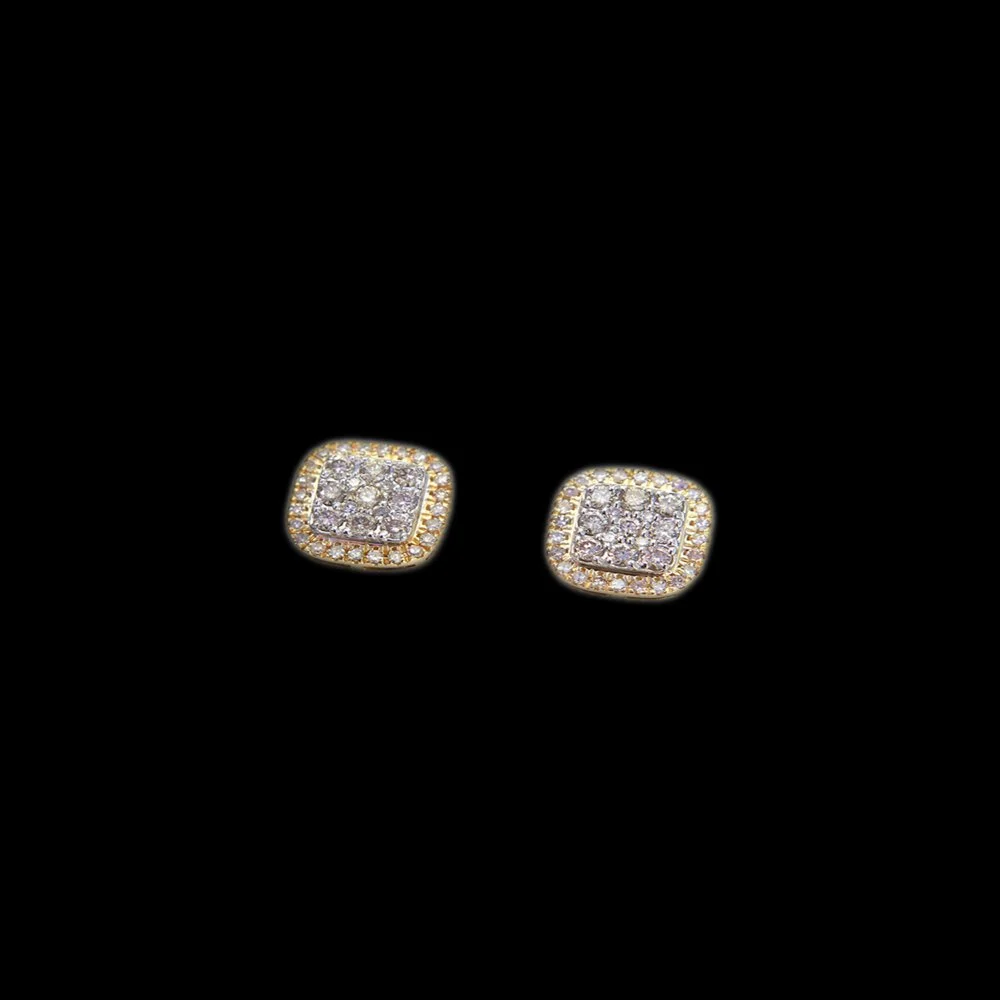 Pair of square-shaped diamond earrings with gold and diamond borders on a black background.
