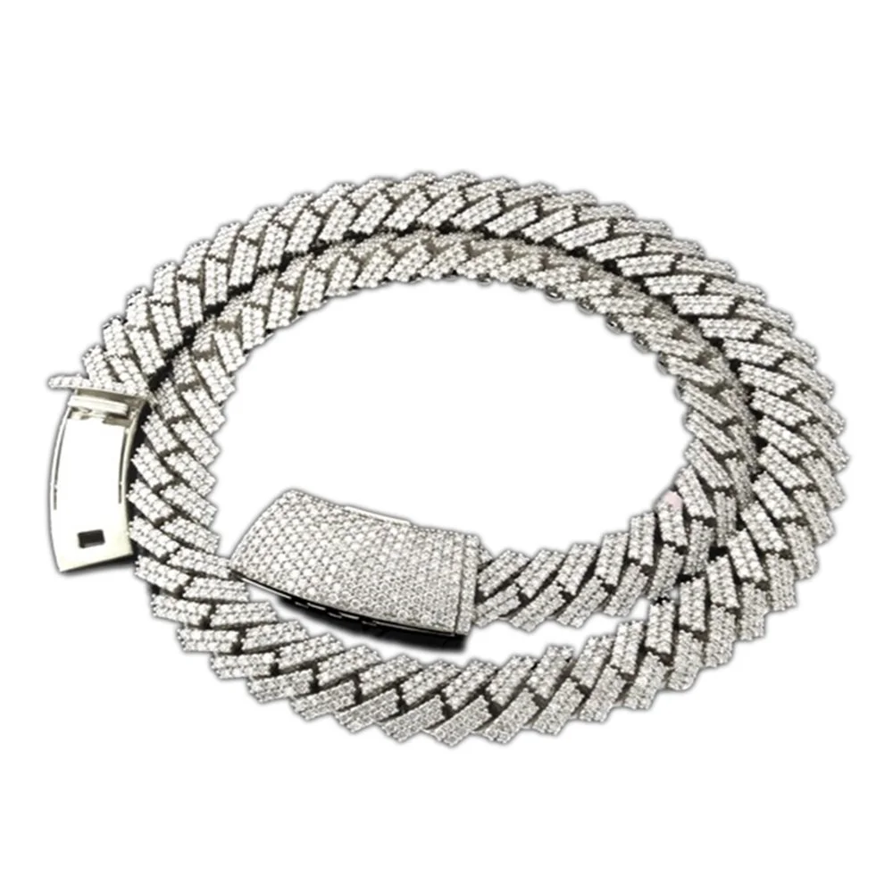 A silver, diamond-encrusted hip-hop style chain with a clasp.