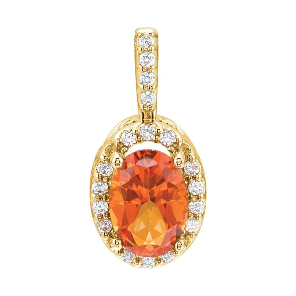 Gold pendant with oval orange gemstone surrounded by small white diamonds.