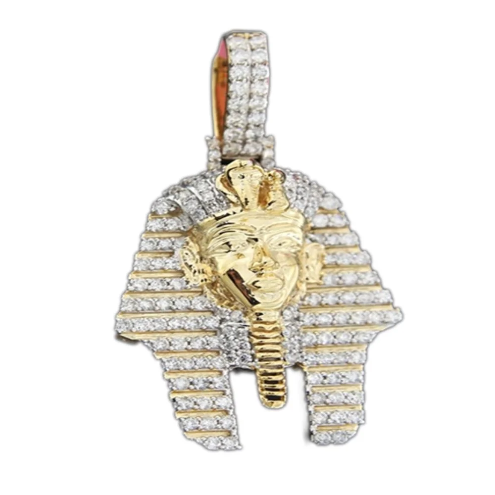Gold and silver Egyptian-style pendant with a pharaoh's face surrounded by diamonds.