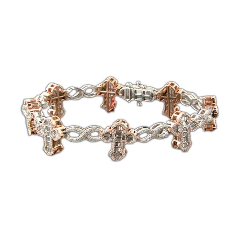 A diamond cross bracelet with alternating rose gold and silver sections.
