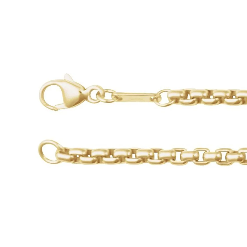 Close-up of a gold chain necklace with a lobster clasp.