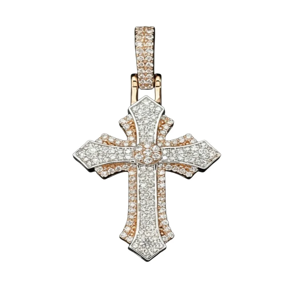Gold and silver cross pendant adorned with numerous small diamonds or gemstones.