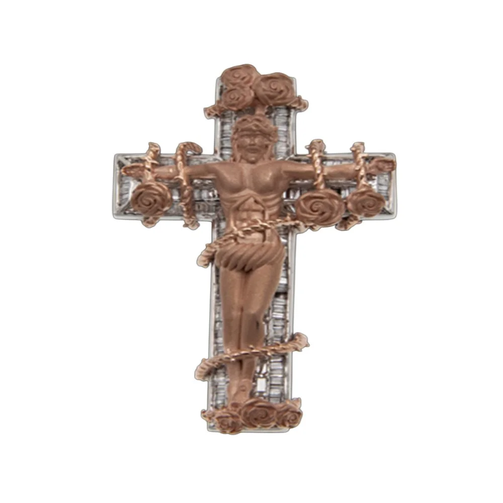 Jewelry pendant shaped like Jesus Christ on a cross, with detailed features and decorative roses.